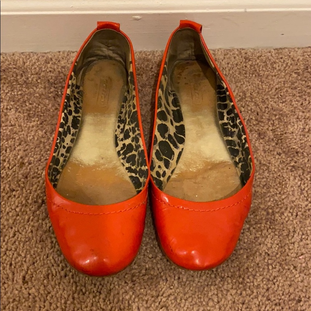 Coach patent leather flats.